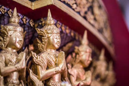 The Golden Buddha statue to gild. Which people use to worship the buddha image. Selective focus.の写真素材