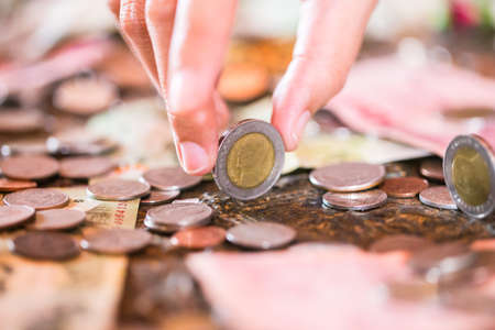 Thai baht, money, Thai coin.Money thai coins ( bath) staircase sorted. King of Thailand. The concept of financial planning, savings, Business successful, Business progress.の写真素材