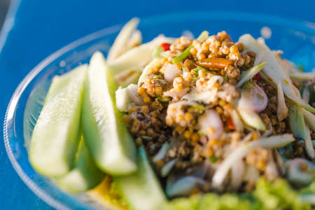 Thai food - Spicy Horseshoe Crab Egg Salad, Pimp egg salad. Thai sea food. Signature menu of Thai sea food.の写真素材