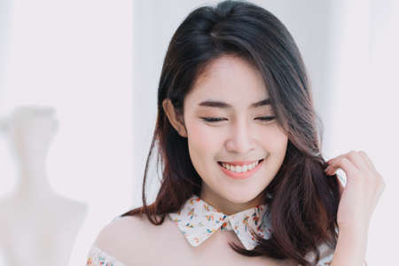 portrait of beautiful asian girl with beautiful clothing and chilling posting.の写真素材