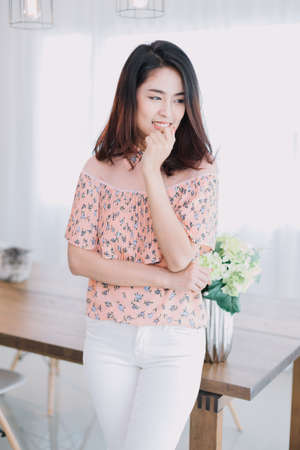 portrait of beautiful asian girl with beautiful clothing and chilling posting.の写真素材