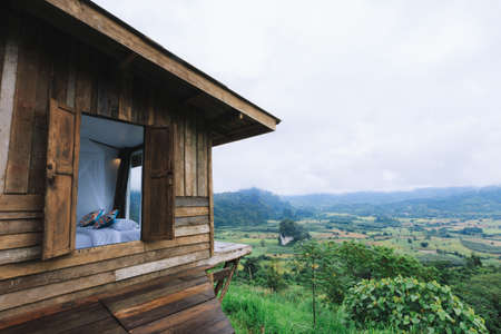 Wooden Homestay and beautiful mountains view in morning at Phu Langka National Park in Phayao Province, Thailand.の写真素材