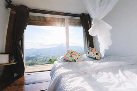 Wooden Homestay and beautiful mountains view in morning at Phu Langka National Park in Phayao Province, Thailand.の写真素材