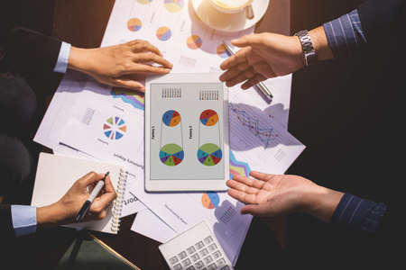 Hand of Businessman and businesswoman presenting their business projectの写真素材