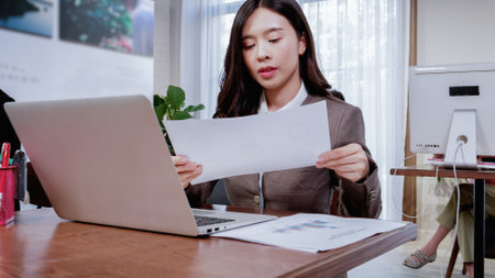 Asia woman use notebook female hands keyboarding laptop using texting pointing networking green screen chroma key chromakey keyboard white device working message student businesswomanの写真素材