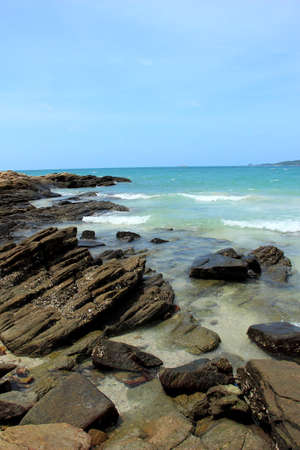 rocks and sea with blue skyの写真素材