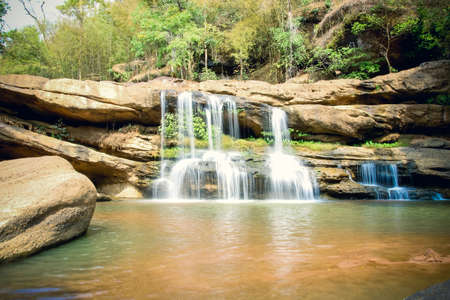 waterfall in the forest at khao yai national park, thailandの写真素材