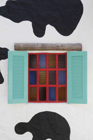 retro wood red windows on white wallの写真素材