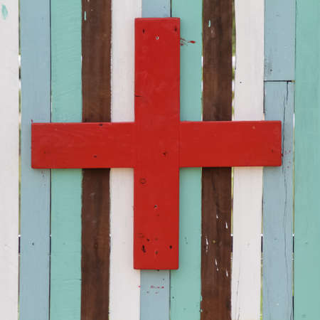 red cross symbol on retro wood backgroundの写真素材