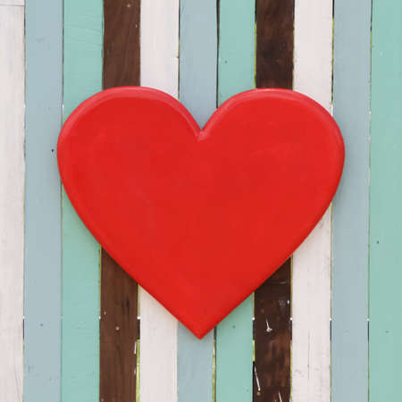red heart on the retro wood backgroundの写真素材
