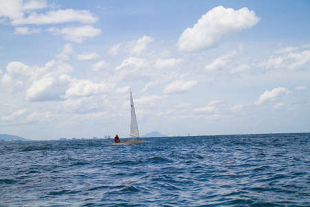 Unidentified sailing competitors in King' cups Hua Hin Regatta 2012 - Hua Hin Beach near Hyatt Hotel on August 11, 2012 in Hua Hin, Thailandのeditorial素材