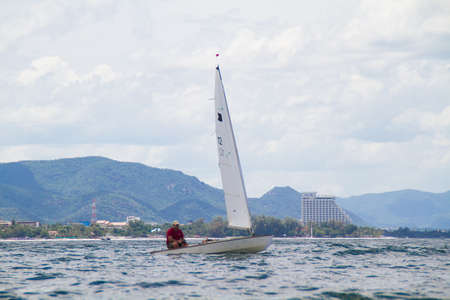 Unidentified sailing competitors in King' cups Hua Hin Regatta 2012 - Hua Hin Beach near Hyatt Hotel on August 11, 2012 in Hua Hin, Thailandのeditorial素材