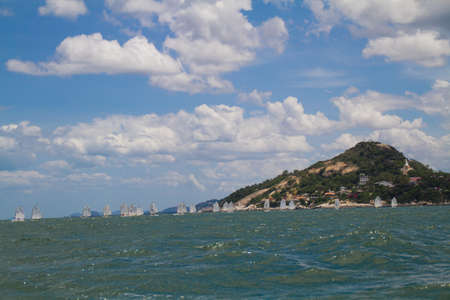 Unidentified sailing competitors in King' cups Hua Hin Regatta 2012 - Hua Hin Beach near Hyatt Hotel on August 11, 2012 in Hua Hin, Thailandのeditorial素材