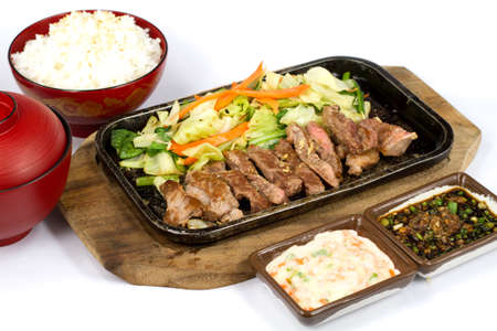 Japanese food style beef grilled the plate on white backgroundの写真素材