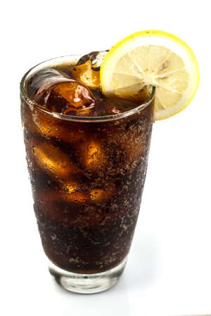a glass of cola in white backgroundの写真素材