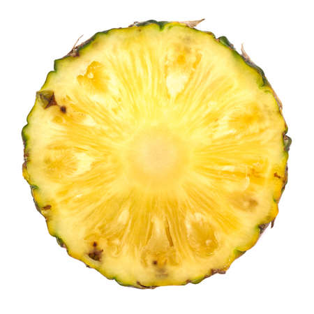 Pineapple with slices on white backgroundの写真素材