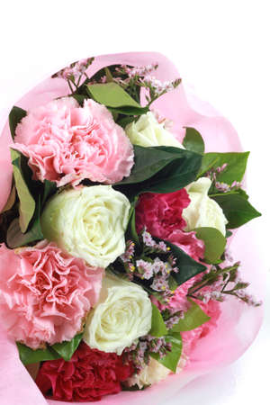 flower bouquet in basket isolated white backgroundの写真素材