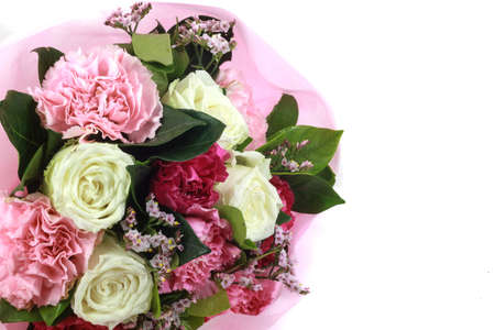 flower bouquet in basket isolated white backgroundの写真素材