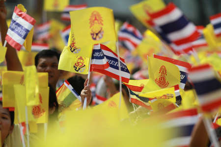 BANGKOK ,THAILAND - DECEMBER 5: Unidentified Hundreds of thousands of people thronged the Royal Plaza to help celebrate HM's 85th birthday; the King is the world's longest-reigning monarch. His Majesty ended his birthday speech delivered to all well-wisheのeditorial素材
