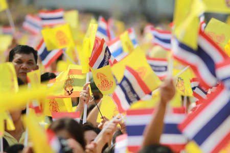 BANGKOK ,THAILAND - DECEMBER 5: Unidentified Hundreds of thousands of people thronged the Royal Plaza to help celebrate HM's 85th birthday; the King is the world's longest-reigning monarch. His Majesty ended his birthday speech delivered to all well-wisheのeditorial素材