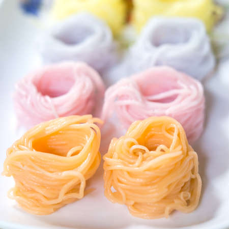 colorful of Thai vermicelli eaten with Thai curryの写真素材