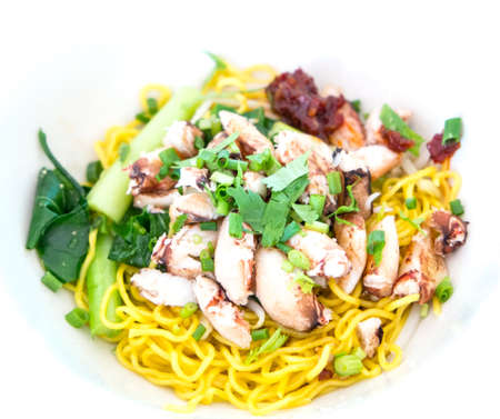 crap in yellow noodle Thailand foodの写真素材