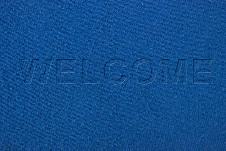 Text Welcome on blue shirt texture backgroundの写真素材