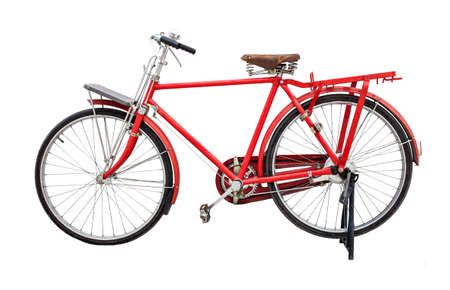 vintage red bicycle isolated on white backgroundの写真素材