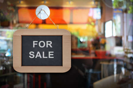 the banner sign hang on the door in coffee shopの写真素材
