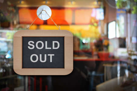  the banner sign hang on the door in coffee shopの写真素材