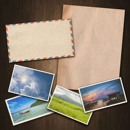 vintage paper , postcard ,envelope on wood backgroundの写真素材