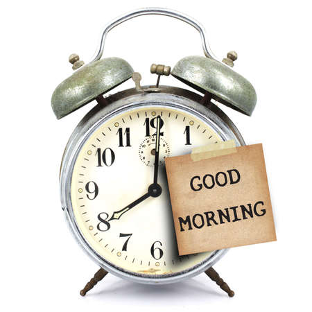 text good morning on vintage retro alarm clock and short note on white backgroundの写真素材
