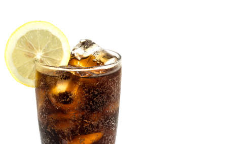 a glass of cola in white backgroundの写真素材