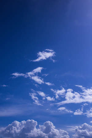 Blue sky with cloudsの写真素材
