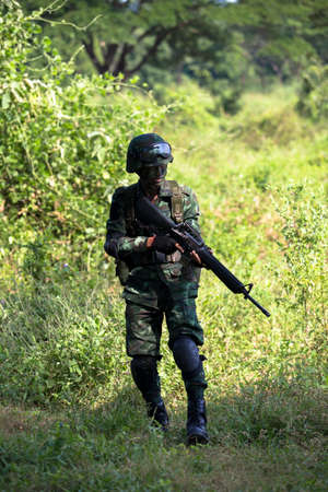 Hua Hin - December  03, 2013: Thai royal army soldier maneuver  03 december ,2013  in Pranburi , Prachuabkirikhan, THAILAND.のeditorial素材