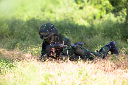 Hua Hin - December  03, 2013: Thai royal army soldier maneuver  03 december ,2013  in Pranburi , Prachuabkirikhan, THAILAND.のeditorial素材