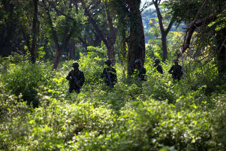 Hua Hin - December  03, 2013: Thai royal army soldier maneuver  03 december ,2013  in Pranburi , Prachuabkirikhan, THAILAND.のeditorial素材
