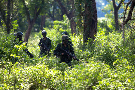 Hua Hin - December  03, 2013: Thai royal army soldier maneuver  03 december ,2013  in Pranburi , Prachuabkirikhan, THAILAND.のeditorial素材