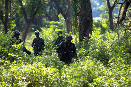 Hua Hin - December  03, 2013: Thai royal army soldier maneuver  03 december ,2013  in Pranburi , Prachuabkirikhan, THAILAND.のeditorial素材