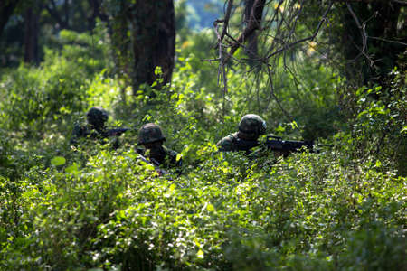Hua Hin - December  03, 2013: Thai royal army soldier maneuver  03 december ,2013  in Pranburi , Prachuabkirikhan, THAILAND.のeditorial素材