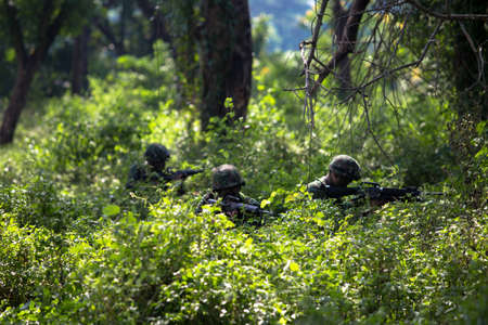 Hua Hin - December  03, 2013: Thai royal army soldier maneuver  03 december ,2013  in Pranburi , Prachuabkirikhan, THAILAND.のeditorial素材