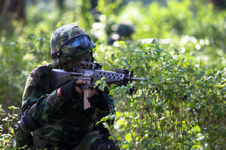 Hua Hin - December  03, 2013: Thai royal army soldier maneuver  03 december ,2013  in Pranburi , Prachuabkirikhan, THAILAND.のeditorial素材