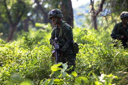 Hua Hin - December  03, 2013: Thai royal army soldier maneuver  03 december ,2013  in Pranburi , Prachuabkirikhan, THAILAND.のeditorial素材