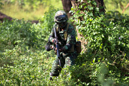 Hua Hin - December  03, 2013: Thai royal army soldier maneuver  03 december ,2013  in Pranburi , Prachuabkirikhan, THAILAND.のeditorial素材