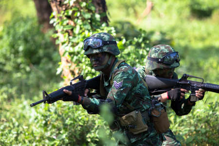 Hua Hin - December  03, 2013: Thai royal army soldier maneuver  03 december ,2013  in Pranburi , Prachuabkirikhan, THAILAND.のeditorial素材