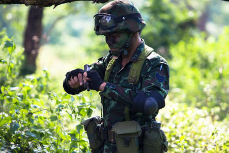 Hua Hin - December  03, 2013: Thai royal army soldier maneuver  03 december ,2013  in Pranburi , Prachuabkirikhan, THAILAND.のeditorial素材