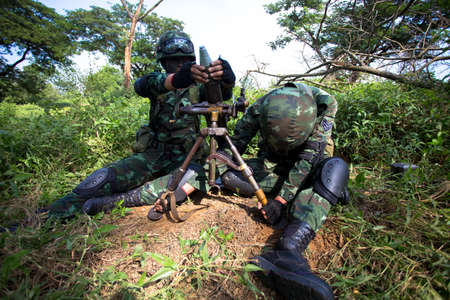 Hua Hin - December  03, 2013: Thai royal army soldier maneuver  03 december ,2013  in Pranburi , Prachuabkirikhan, THAILAND.のeditorial素材