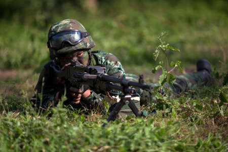 Hua Hin - December  03, 2013: Thai royal army soldier maneuver  03 december ,2013  in Pranburi , Prachuabkirikhan, THAILAND.のeditorial素材