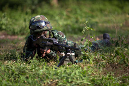 Hua Hin - December  03, 2013: Thai royal army soldier maneuver  03 december ,2013  in Pranburi , Prachuabkirikhan, THAILAND.のeditorial素材