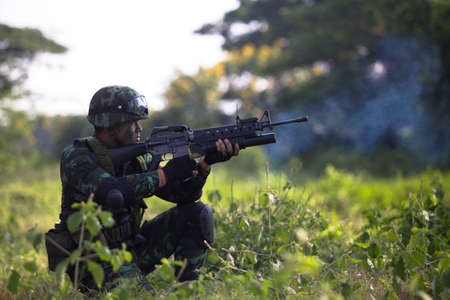 Hua Hin - December  03, 2013: Thai royal army soldier maneuver  03 december ,2013  in Pranburi , Prachuabkirikhan, THAILAND.のeditorial素材
